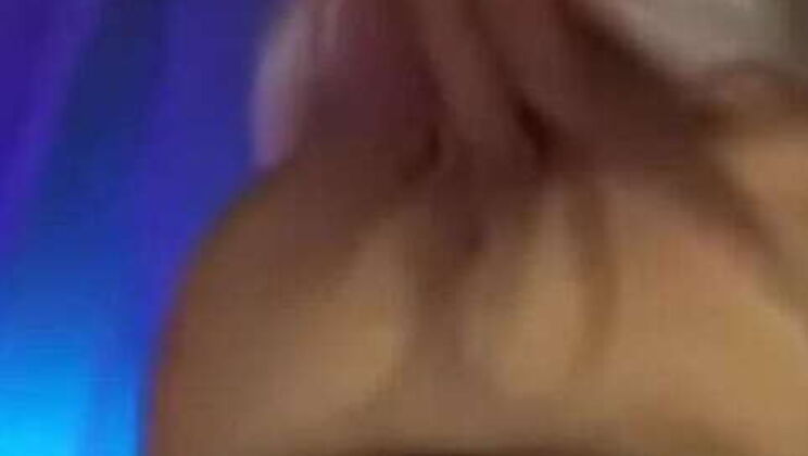 Goth on a Bike with Large Breasts