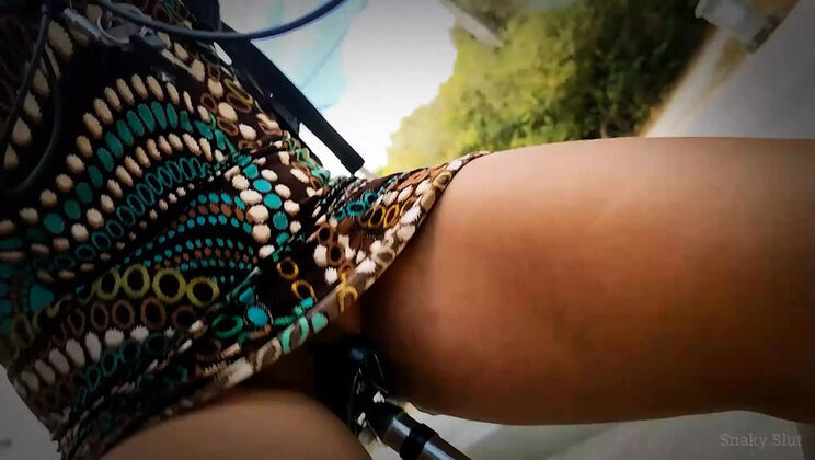 SnakySlut Forgets Her Panties: Hot Brunette Rides Bike with Dildo