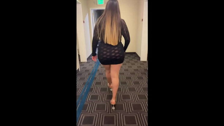 Slutty Latina in See-Through Dress Gives Blowjob in Hotel Hallway