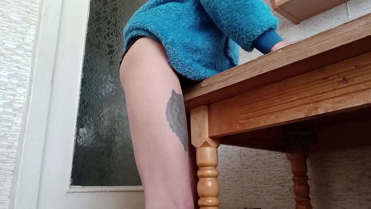 Skinny brunette Stepan masturbates on kitchen table until orgasm