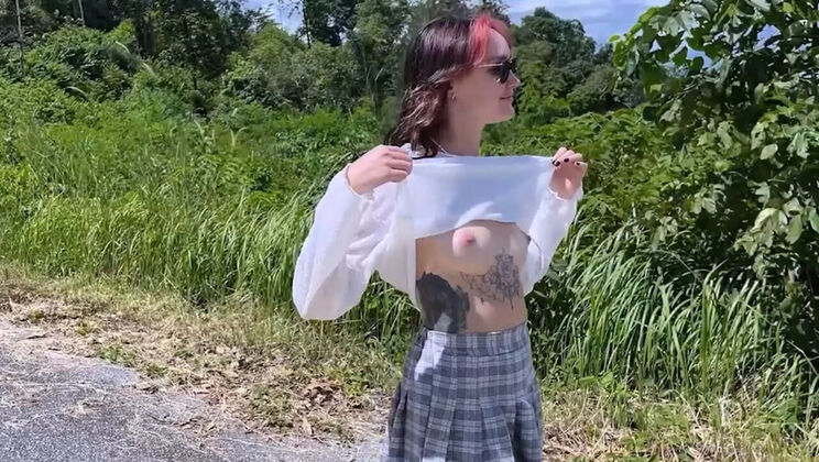 Brunette Teen Loses Bet and Flashes Tits Outdoor Game