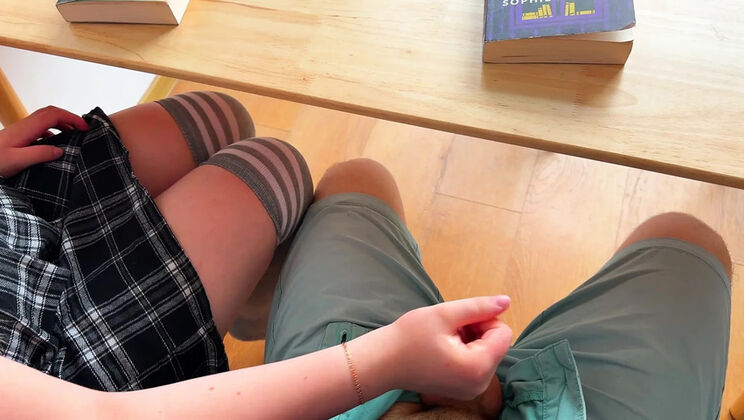 Hot Schoolgirl Gives Handjob and Footjob Under Table in History Class
