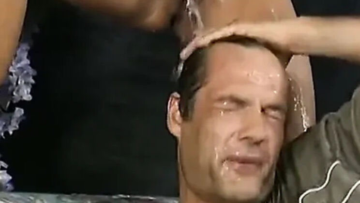 Two Guys Piss on a Piss Slut